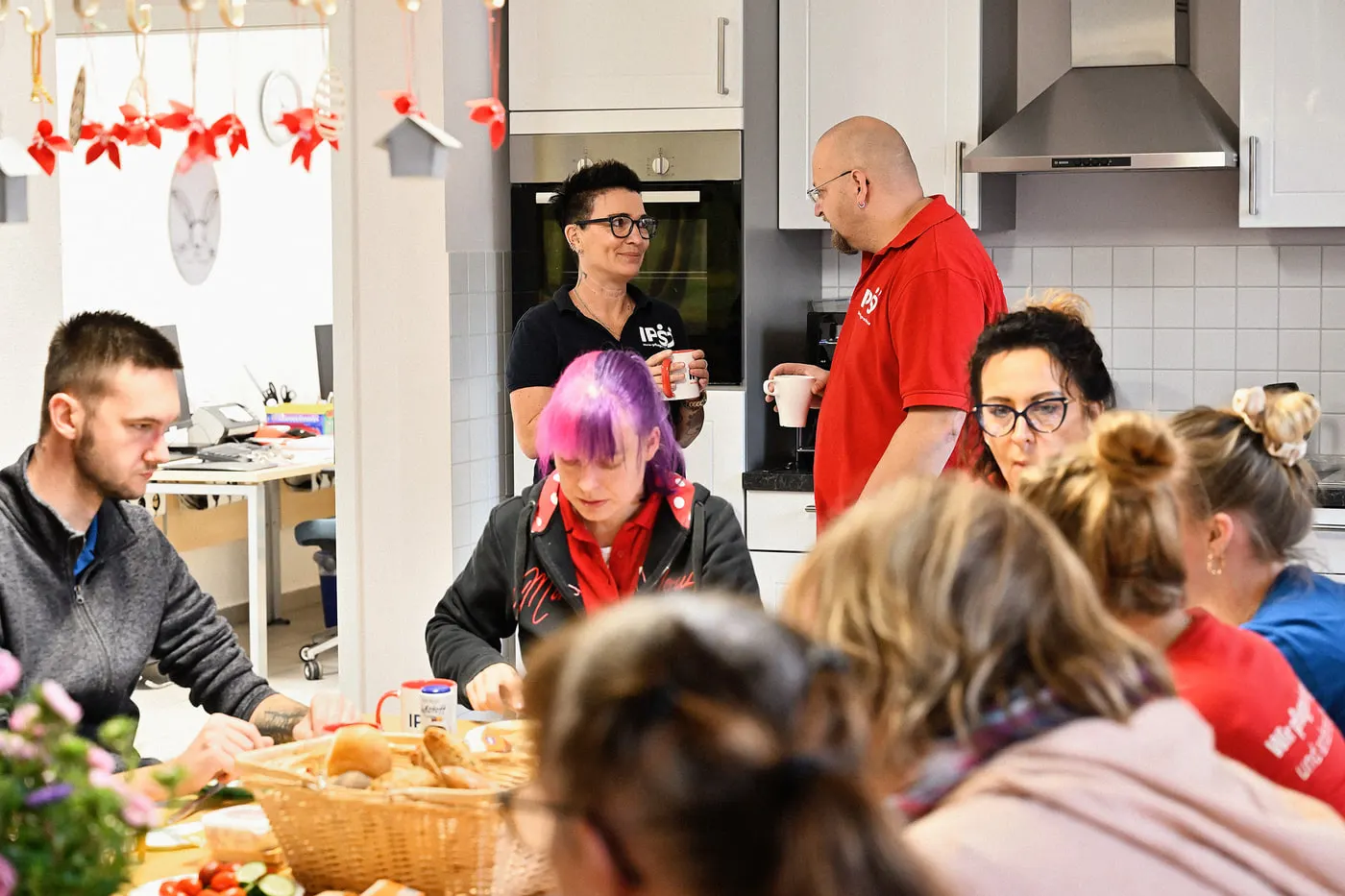 Mitarbeitende von IPS im Alltag